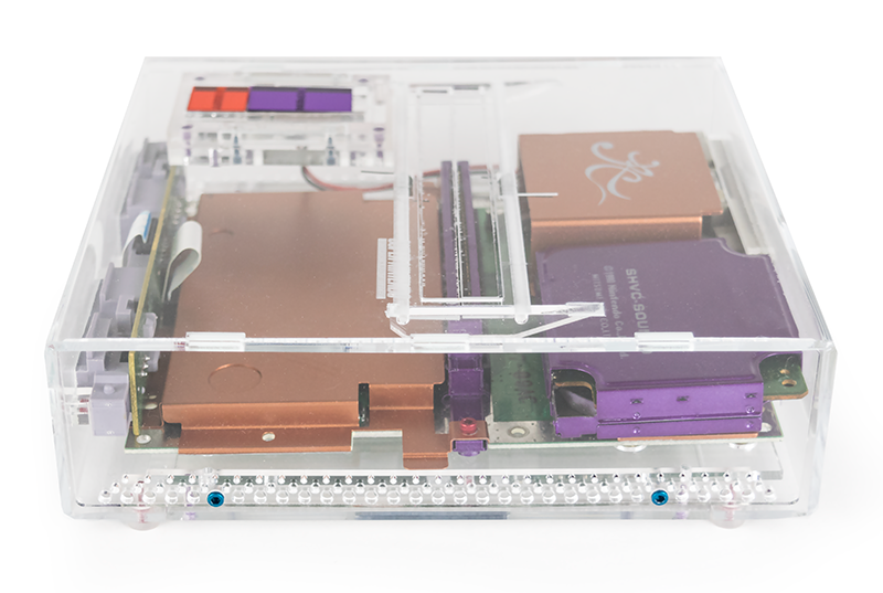Illustration for article titled The Salvaged Guts Of Old SNES Consoles Look Great Inside These New Cases